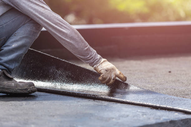 Professional Exterior Waterproofing technician working in Minneapolis, KS